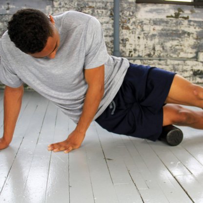 Travel Size Extra Firm Foam Roller in use